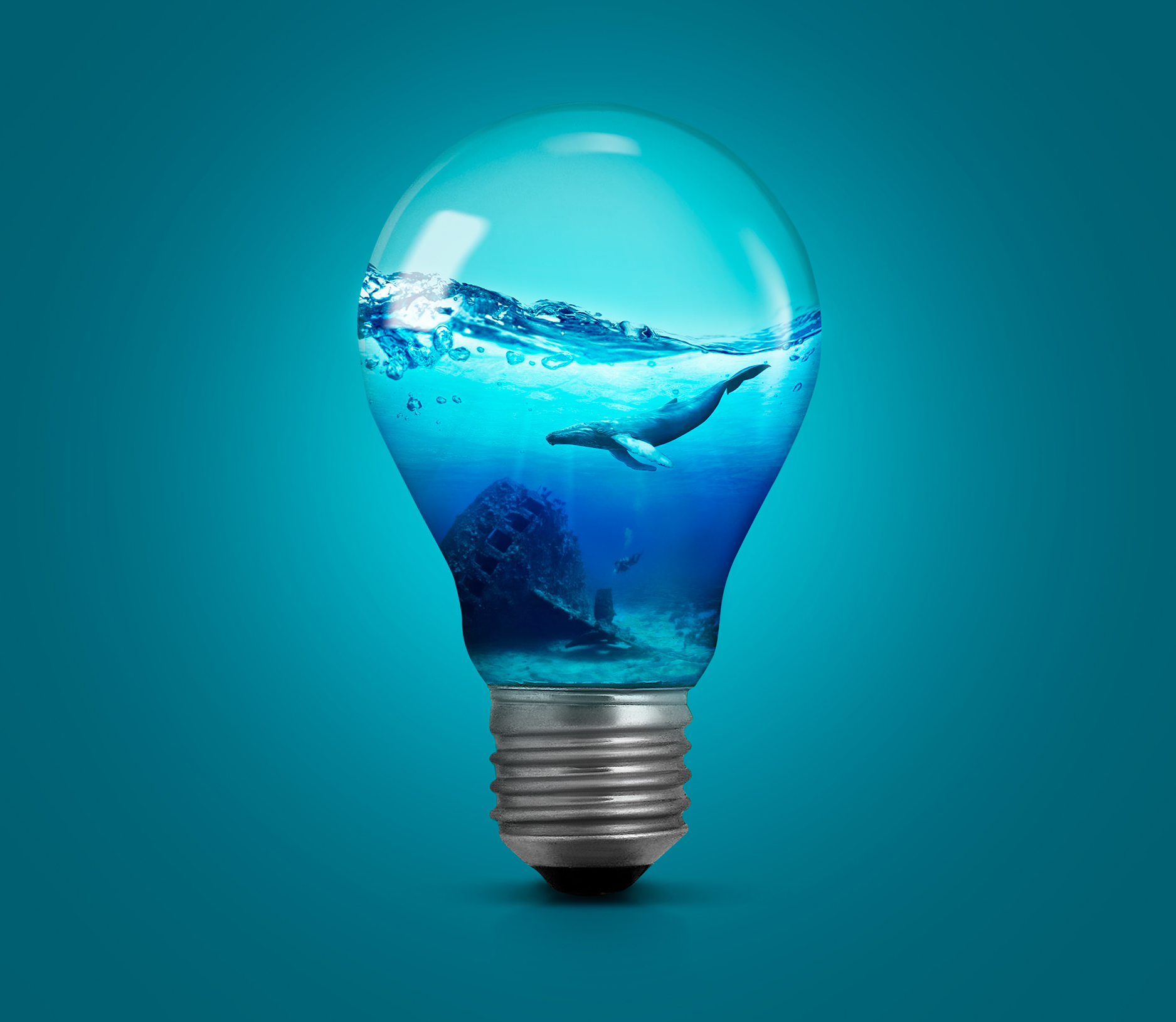 Creative photo manipulation — ocean inside a light bulb with a whale